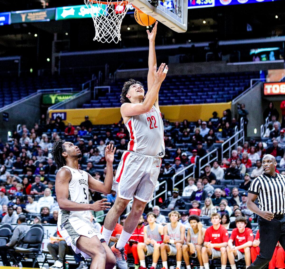 Brandon Benjamin puts up a shot for Mater Dei against St. John Bosco at Crypto.com Arena.