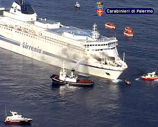 When the blaze started, the ferry was about 25 miles from the Sicilian port. This photo, released by the Italian Carabinieri press ofice, captures the effort to extinguish the fire.
