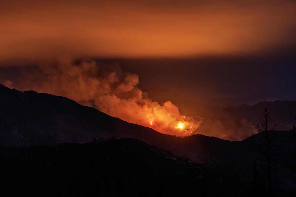 The Line fire continues to burn in the evening just south of Running Springs.