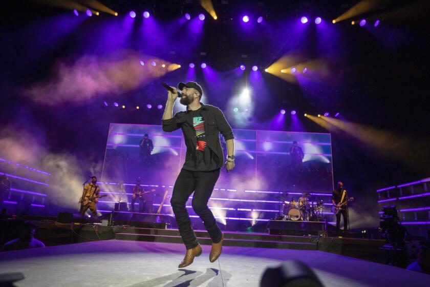 INDIO, CALIF. -- SATURDAY, APRIL 27, 2019: Saturday?s headliner Sam Hunt performs on the Mane Stage on the second of the three-day 2019 Stagecoach Country Music Festival, the world?s biggest country music festival, at the Empire Polo Fields in Indio, Calif., on April 27, 2019. Stagecoach fans have the chance to watch some 75 performers and DJs over three days. (Allen J. Schaben / Los Angeles Times)