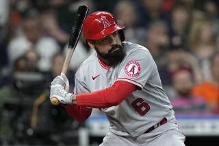 Los Angeles Angels' Anthony Rendon (6) bats against the Houston Astros.