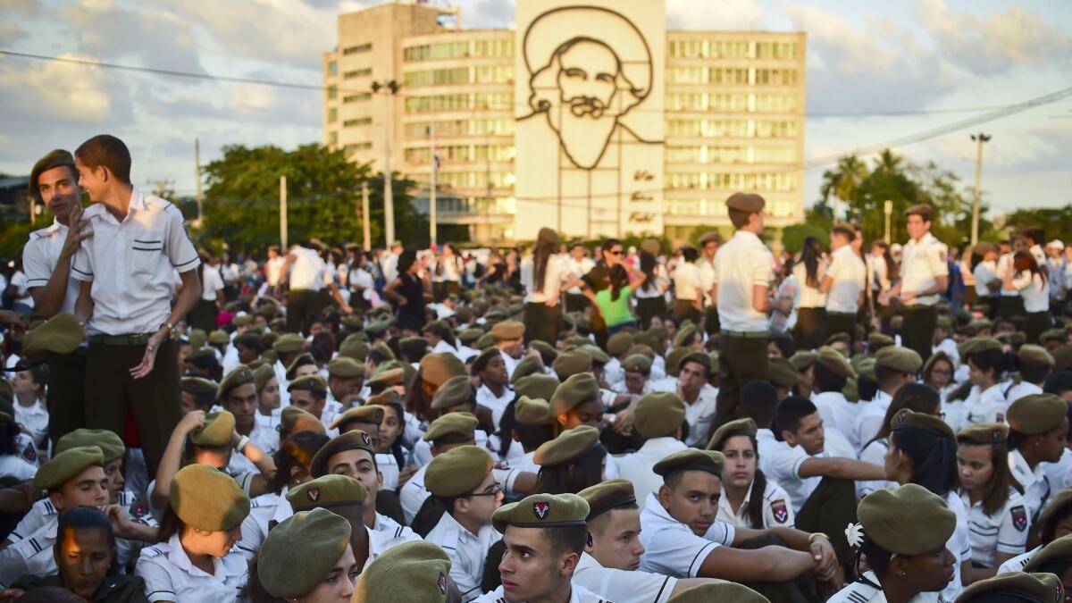 Students gather at Revolution Square to pay homage to late Cuban revolutionary leader Fidel Castro, in Havana, on November 29, 2016.