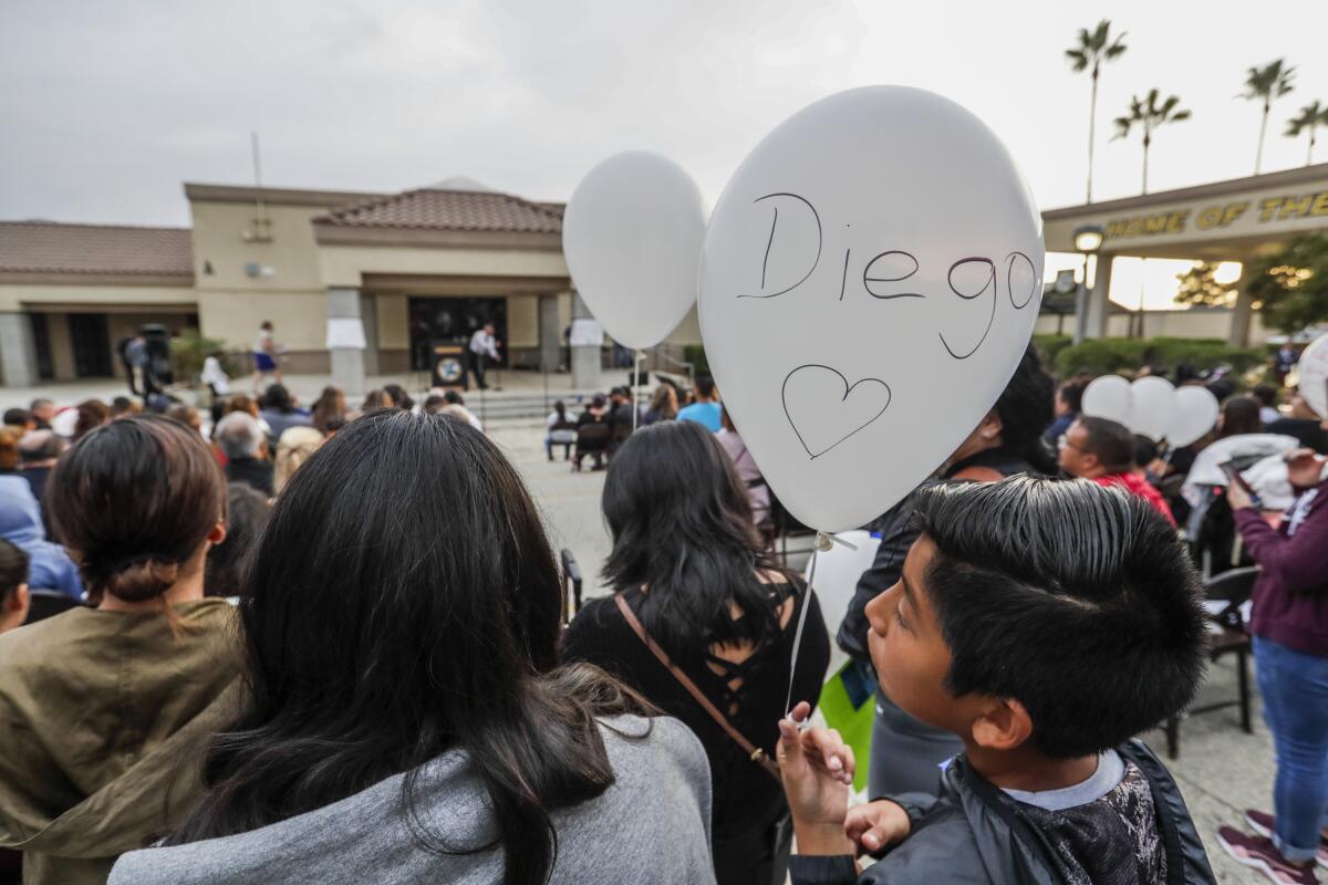 Thousands attend a memorial service at Landmark Middle School, to honor slain student, Diego.