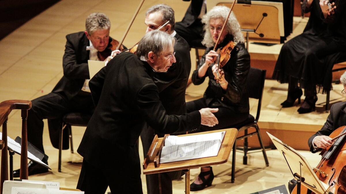Michael Tilson Thomas conducts the San Francisco Symphony in Berg's Violin Concerto with Gil Shaham (center rear) as soloist at Walt Disney Concert Hall Tuesday