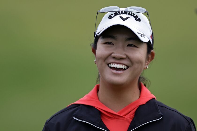 Rose Zhang reacts after the final round of the Mizuho Americas Open golf tournament, Sunday, June 4, 2023, in Jersey City, N.J. (AP Photo/Adam Hunger)