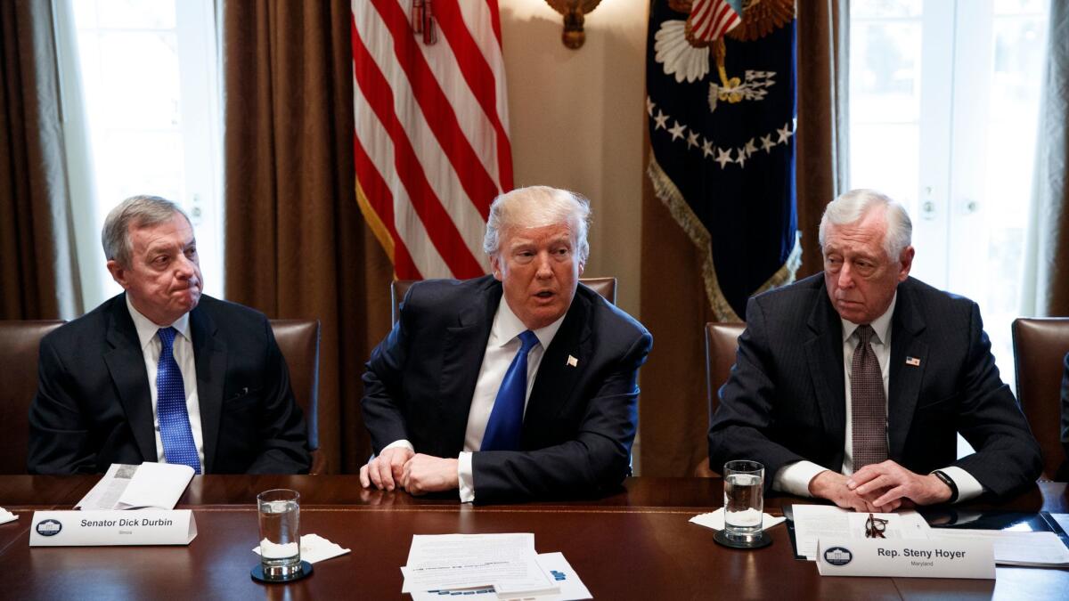 President Trump, with Sen. Richard J. Durbin (D-Ill.), left, and Rep. Steny H. Hoyer (D-Md.).