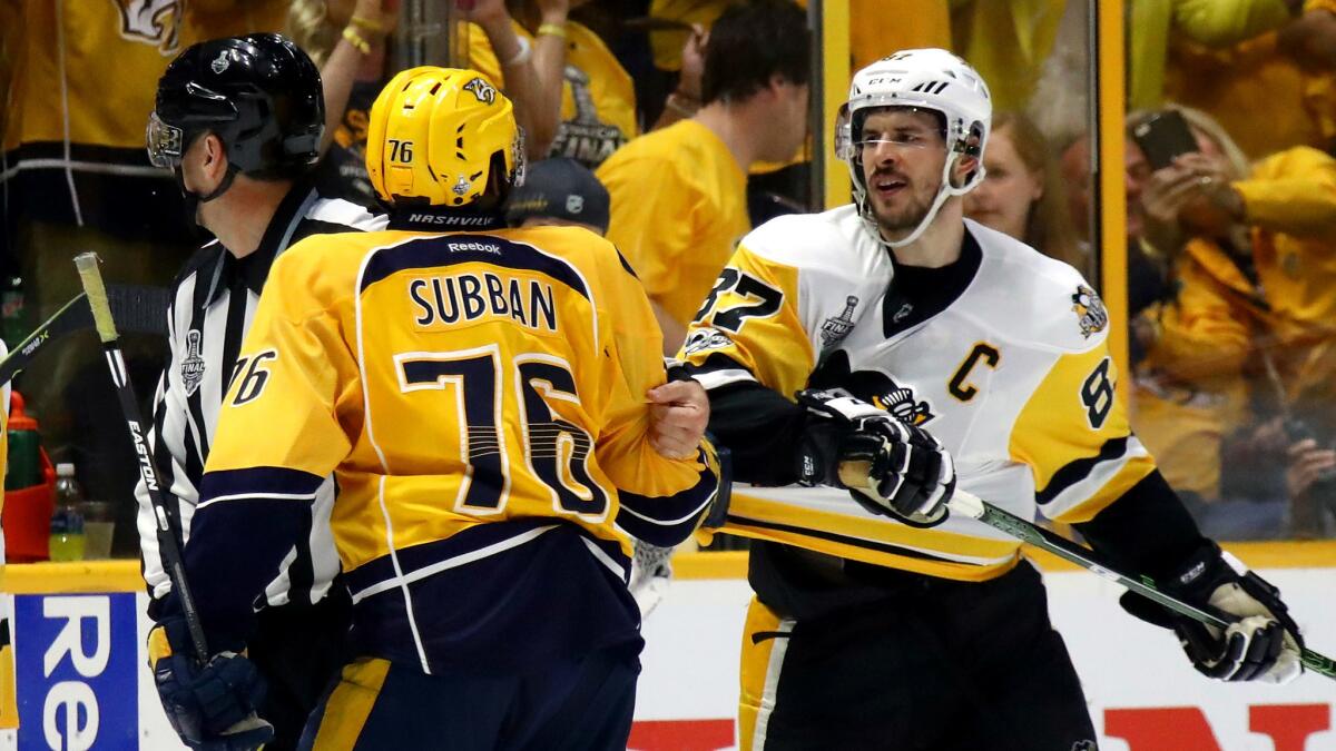 Predators defenseman P.K. Subban and Penguins center Sidney Crosby exchange words during Game 3 of the Stanley Cup Final on Saturday in Nashville.
