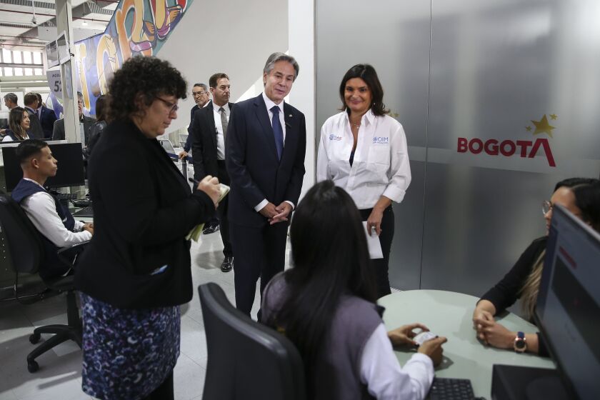 U.S. Secretary of State Antony Blinken visits the Migration Integration Center in Bogota, Colombia, Tuesday, Oct. 4, 2022. (Luisa Gonzalez/Pool Photo via AP)
