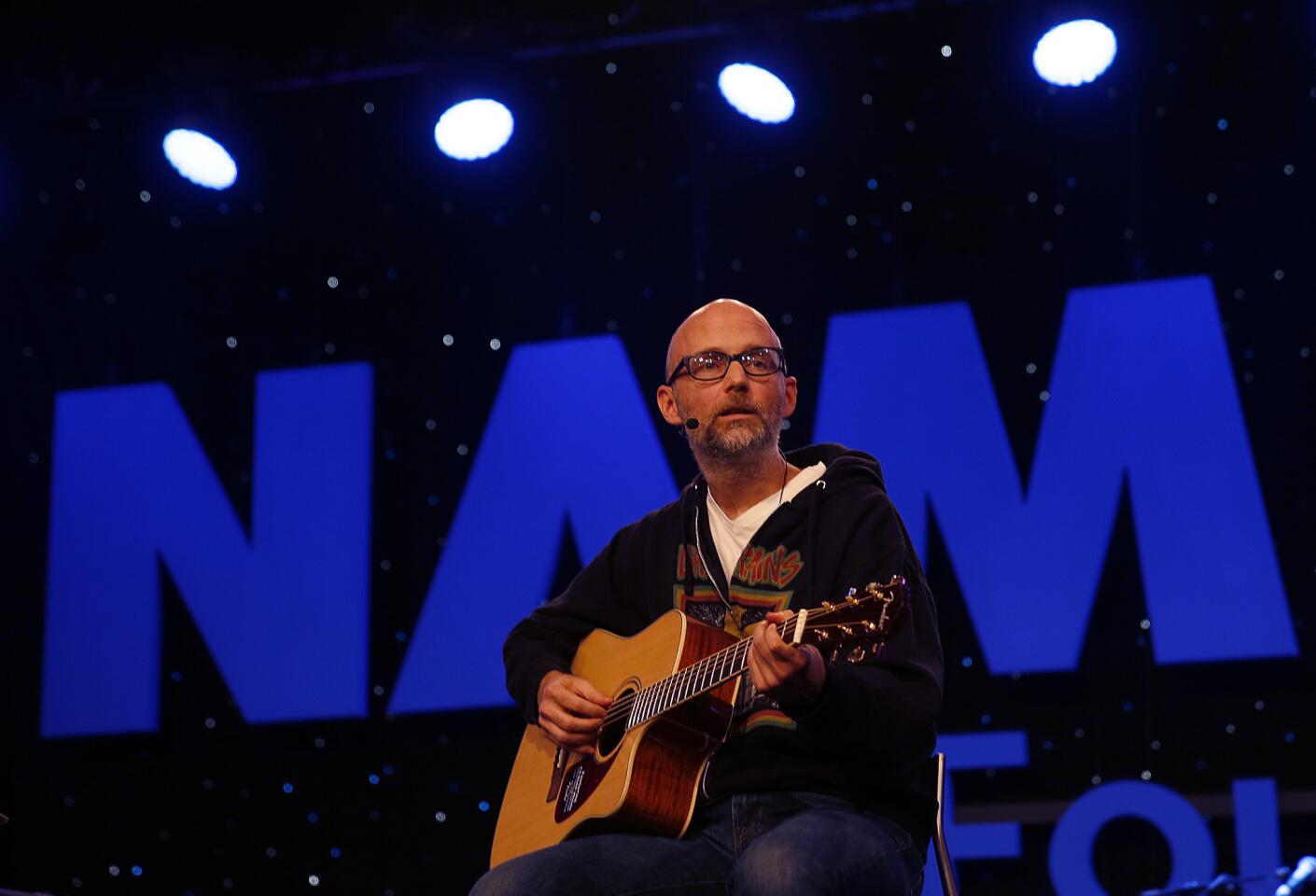 Moby plays an acoustic version of Billy Idol's 'Rebel Yell' in the NAMM Foundation Lounge during the 2015 NAMM show at the Anaheim Convention Center.