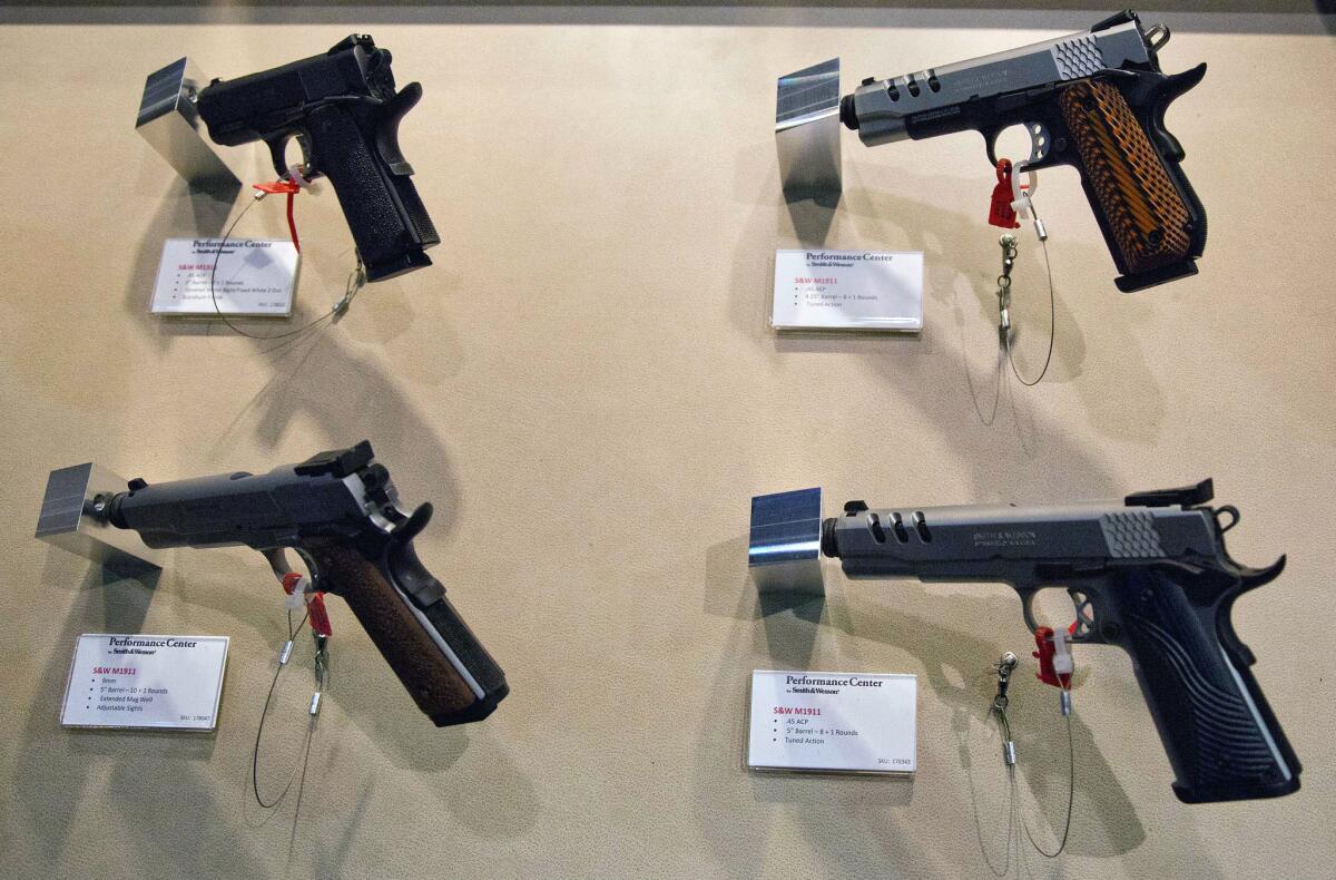 Several of Smith & Wesson's new pistols are displayed at the 35th annual SHOT Show in January in Las Vegas.