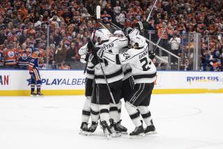 Los Angeles Kings celebrate a goal against the Edmonton Oilers during the third period of Game 1 of an NHL Stanley Cup first-round hockey playoff series in Edmonton, Alberta, Monday, April 17, 2023. (Jason Franson/The Canadian Press via AP)