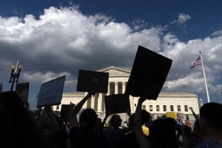 FILE - Abortion-rights activists protest outside the Supreme Court in Washington, Saturday, June 25, 2022. Abortion access groups who received a windfall of donations following the Supreme Court's overturning of Roe v. Wade one year ago say those emergency grants have ended and individual and foundation giving has dropped off. (AP Photo/Jose Luis Magana, File)