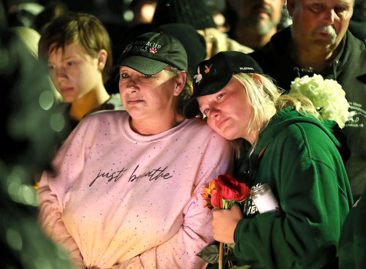 Stacy Goodwin Patino, left and Madison Moyer at the candlelight vigil held for Tatum Goodwin, who was killed Nov. 12.