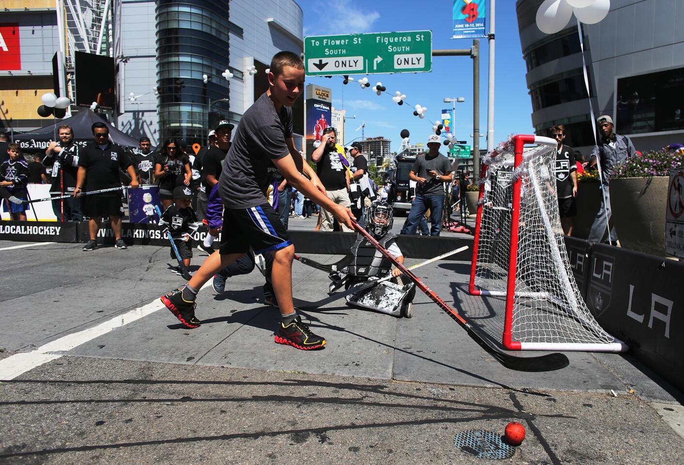Fans play street hockey