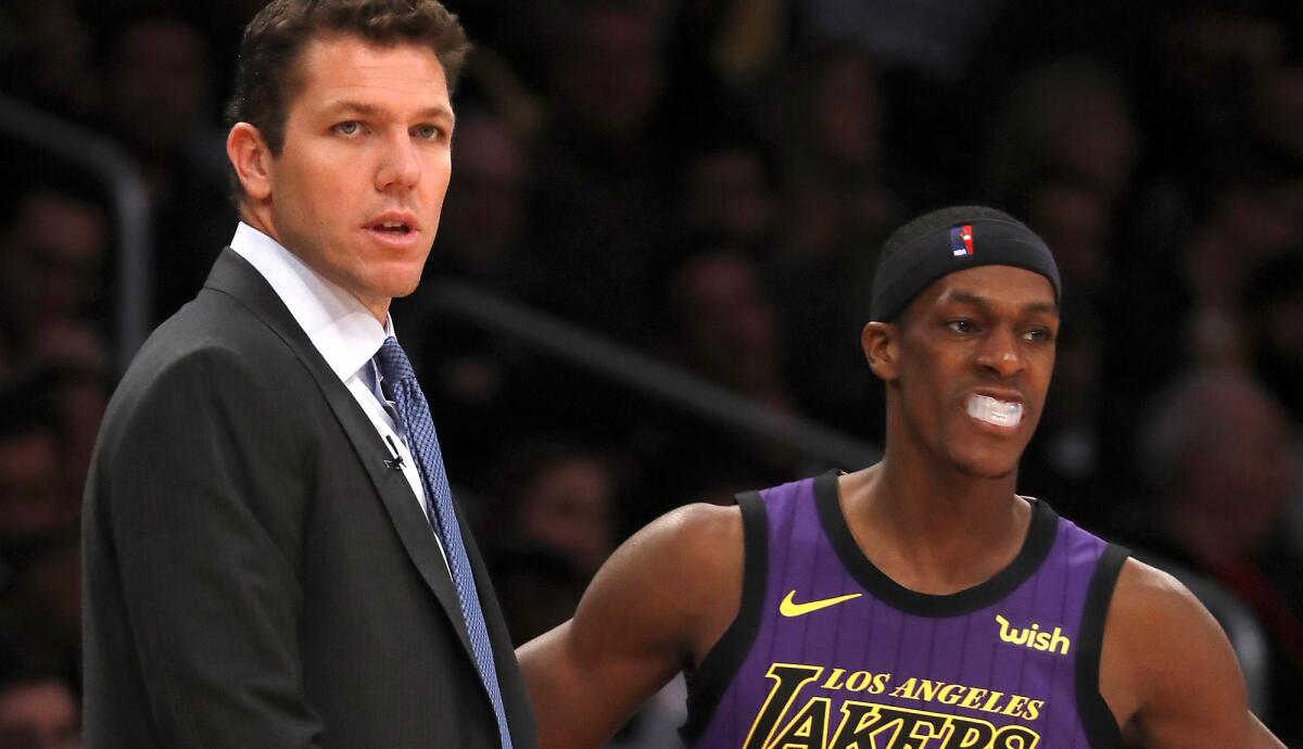 Lakers coach Luke Walton said point guard Rajon Rondo will be out at least two weeks after he broke a bone in his right hand during the game Wednesday night.