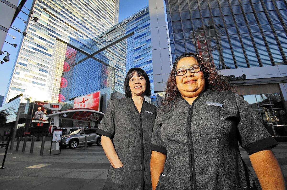 Rosario Alfaro, left, and Sonia Rosales are housekeepers at the JW Marriott hotel at L.A. Live.