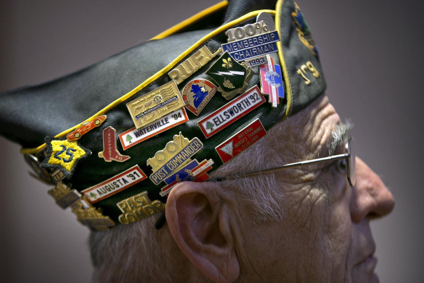 Army veteran Howard Morang, 74, of South China, Maine, attends a Veterans Day ceremony at the Maine Veterans' Home, Wednesday, Nov. 11, 2015, in Augusta, Maine.
