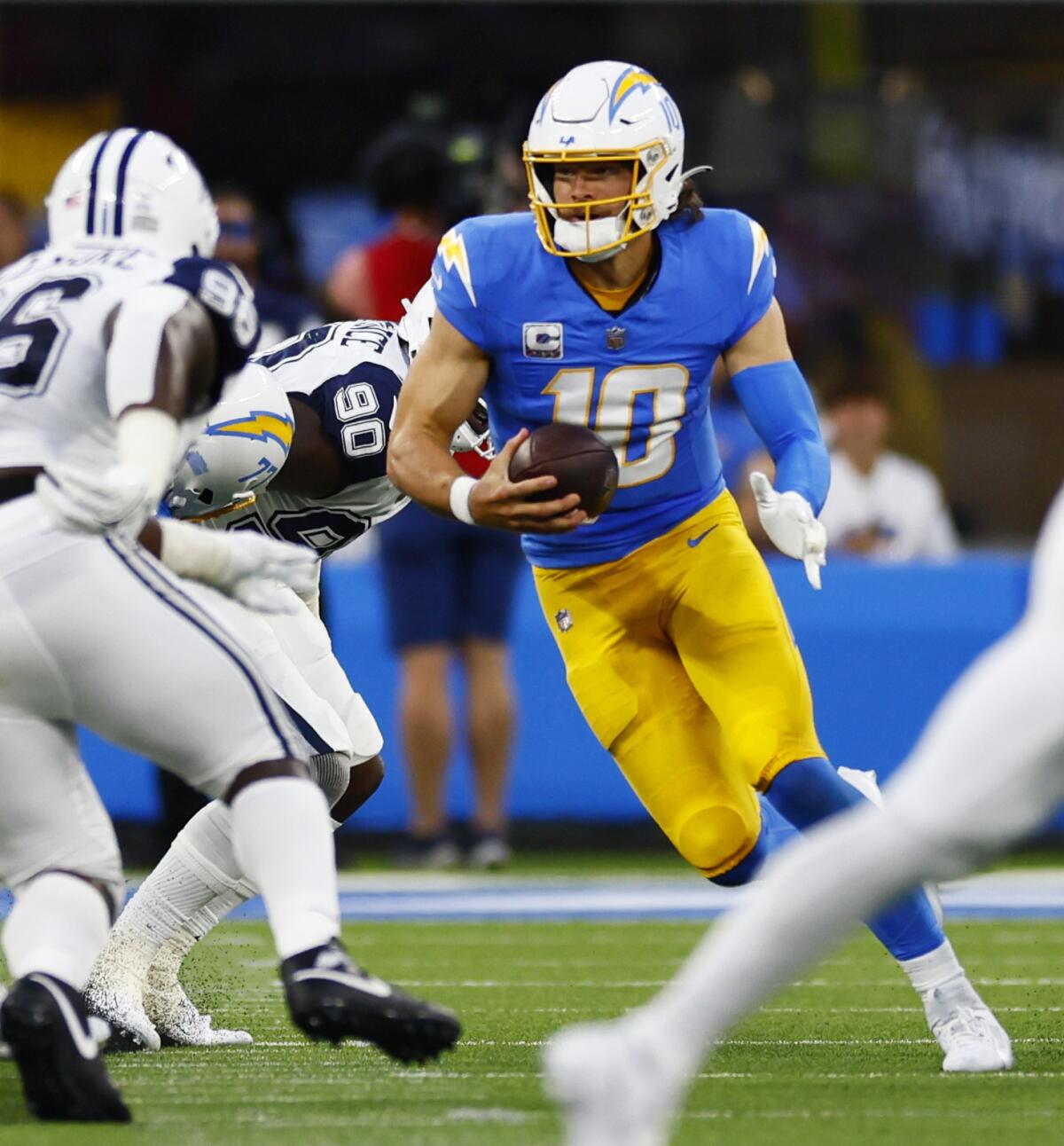 Los Angeles, CA - October 16: Los Angeles Chargers Justin Herbert looks to run.