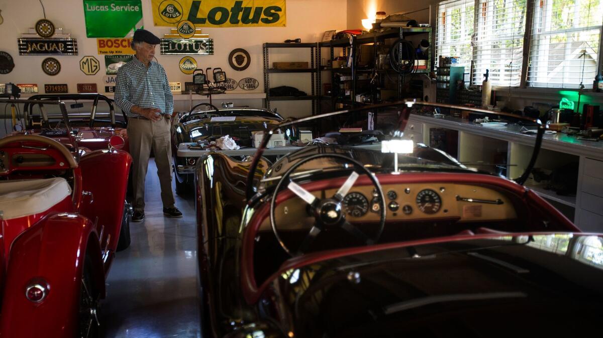 Creighton Turner, among his vintage MGs, Jaguars and Austin-Healeys, stands in the Pasadena garage where he co-founded Car Night more than 35 years ago.