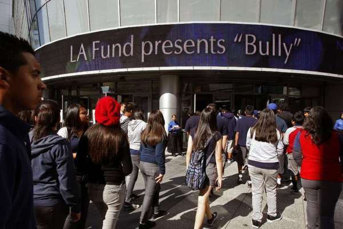 Students attend a special screening in 2012 of the movie "Bully." Researchers who followed children from their middle-school years into early adulthood found bullying victims were far more likely to wind up with social, financial and emotional troubles.