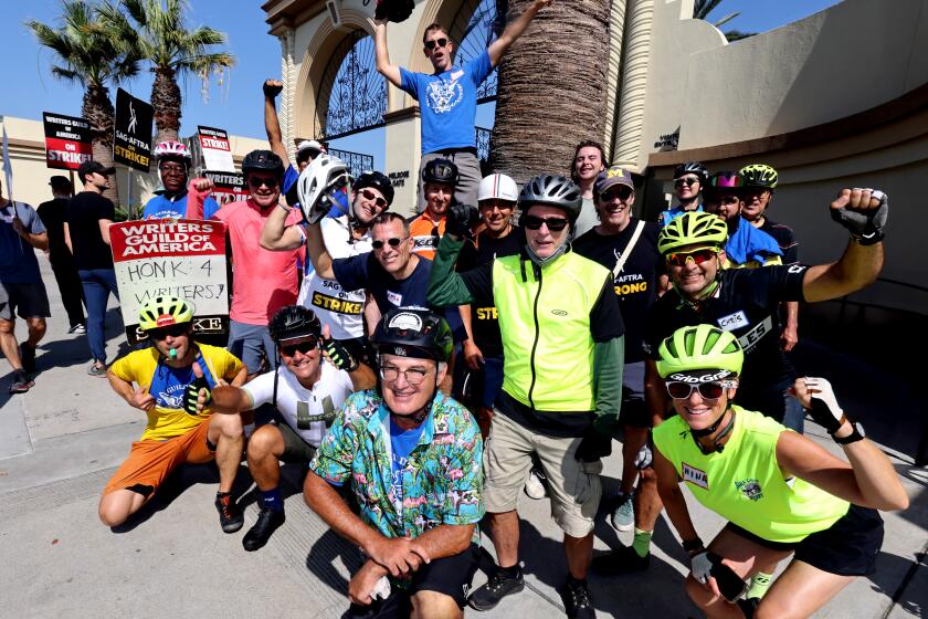 Bike the Strike members gather at the picket line outside Paramount Studios on August 31, 2023 in Los Angeles, California.