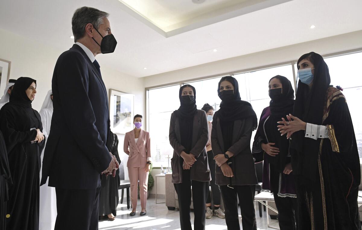 U.S. Secretary of State Antony Blinken meets with members of the exiled Afghan girls robotics team in Doha, Qatar.