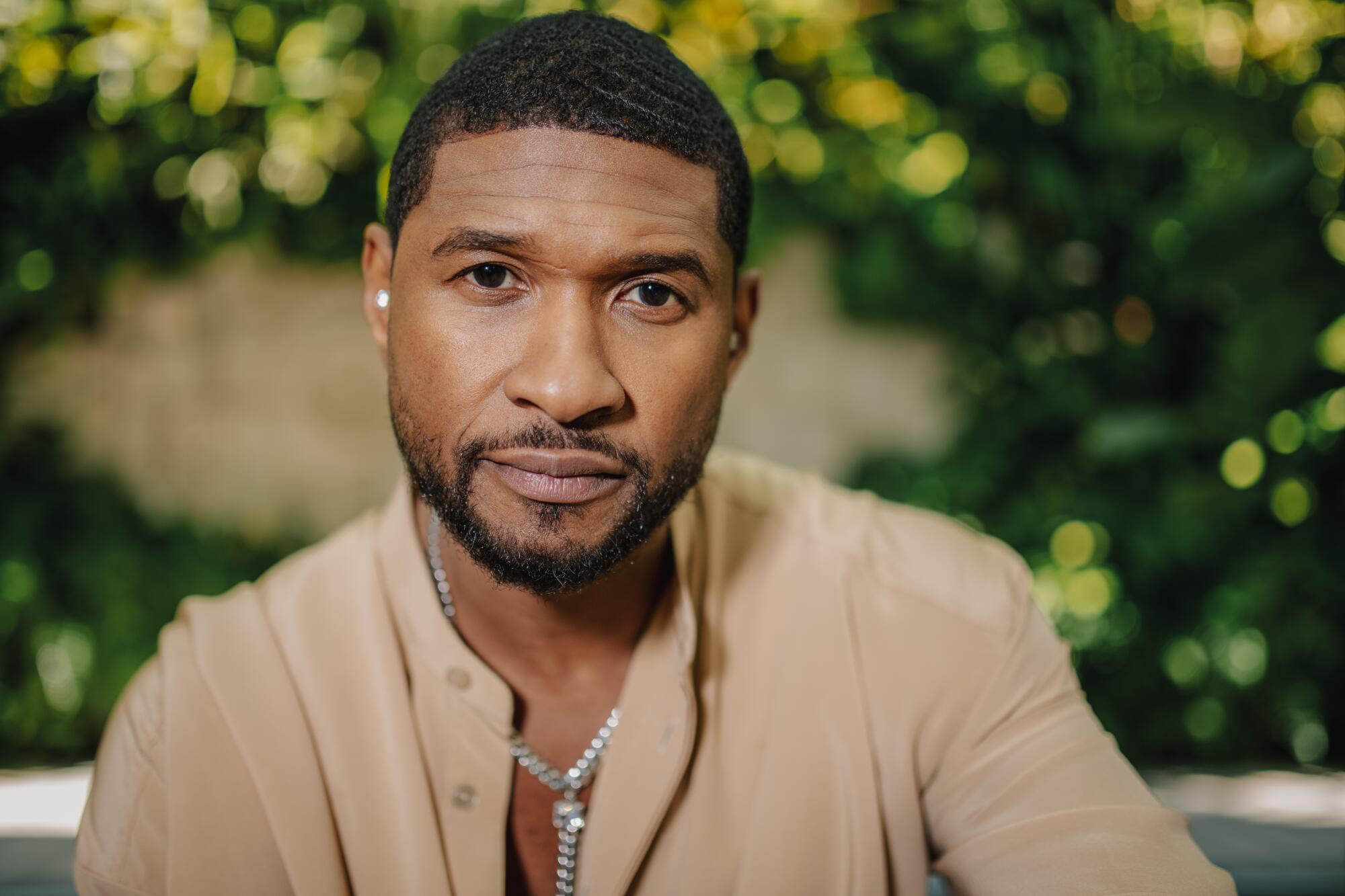Recently Usher Raymond talks romance in music before taking on the Super Bowl half-time show this Sunday in Las Vegas. “I think that a bit of romance has been taken from music because maybe those songs aren’t as relevant as they used to be,” Usher said. (Mariah Tauger / Los Angeles Times)