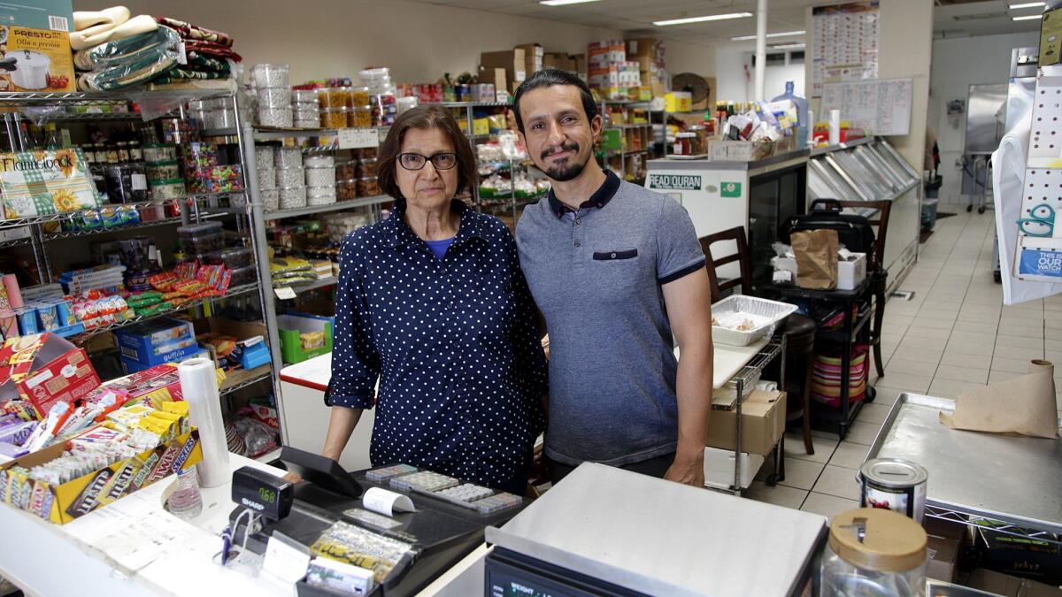 Family Halal Meat Market in Northridge was originally owned by Karima Vidaa, left, and is now run by her son, Otto Tahouri.