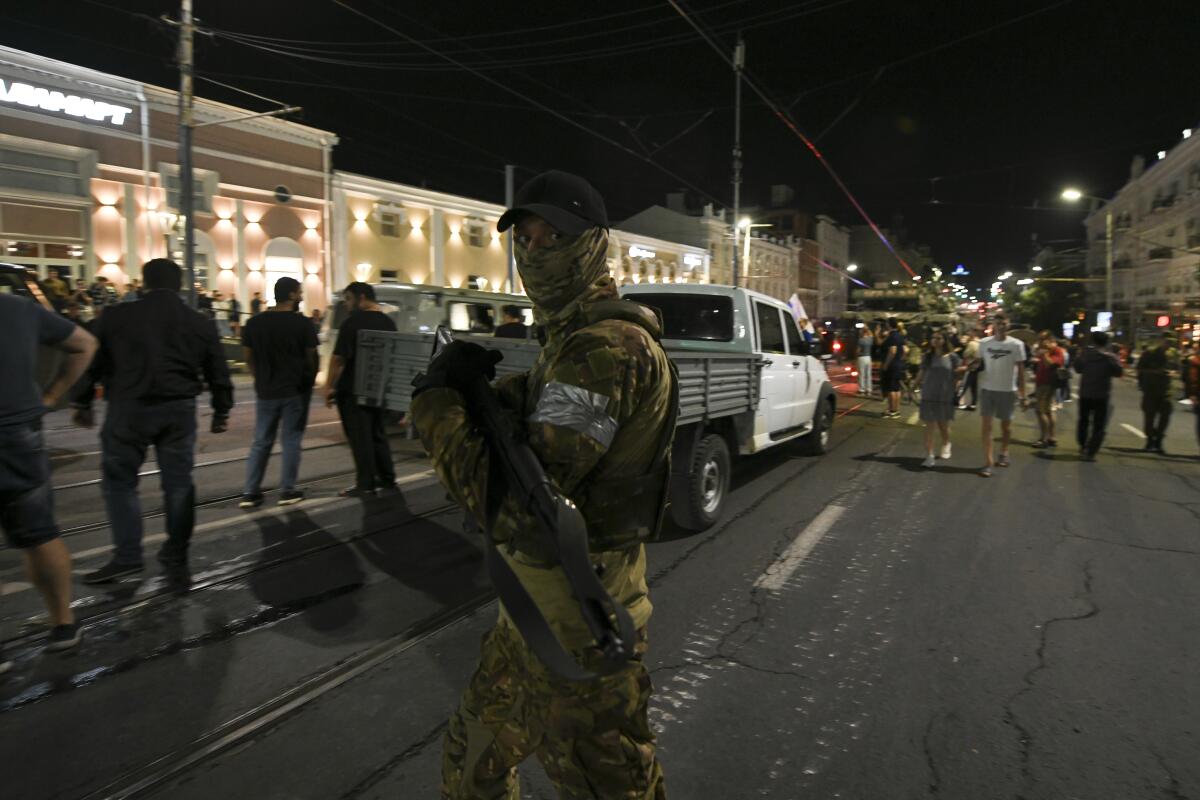 Members of the Wagner Group prepare to depart from the Southern Military District's headquarters