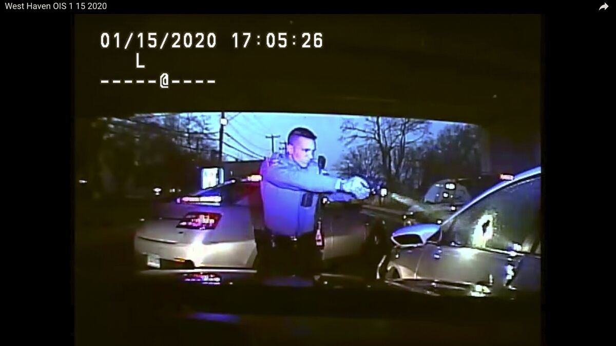 FILE - This Jan. 15, 2020, still image from dashboard camera video released by the Connecticut State Police shows Trooper Brian North after discharging his weapon and fatally shooting Mubarak Soulemane following a high-speed chase. North was arrested Tuesday night, April 19, 2022, in connection with the shooting, state police said. (Connecticut State Police via AP, File)