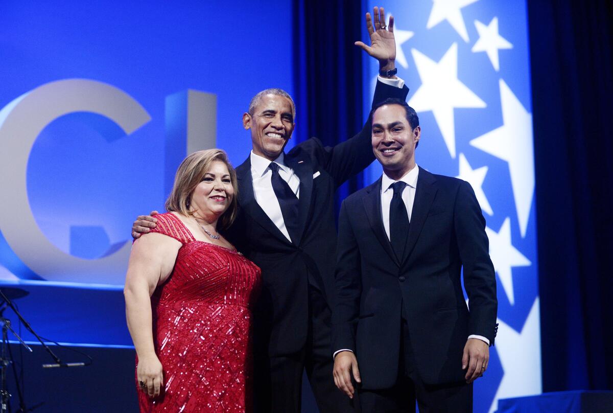 WASHINGTON, DC - OCTOBER 8: U.S. President Barack Obama, flanked by U.S Representative Linda Sanchez (D-CA), chair of the Congressional Hispanic Caucus; and HUD Secretary Julian Castro acknowledges attendees at the Congressional Hispanic Caucus Institute's 38th anniversary awards gala at the Washington Convention Center October 8, 2015 in Washington, DC. The president criticized Republican presidential candidates on immigration reform at the dinner. (Photo by Olivier Douliery-Pool/Getty Images) ** OUTS - ELSENT, FPG, CM - OUTS * NM, PH, VA if sourced by CT, LA or MoD **