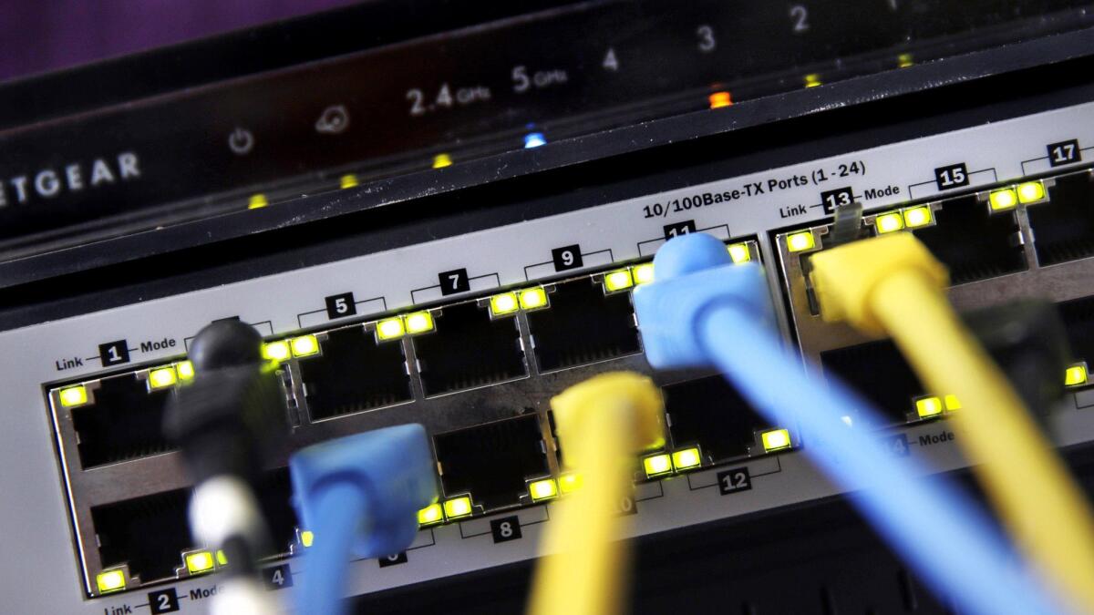 House Democrats introduced a bill Wednesday to restore the strict net neutrality rules the Federal Communications Commission adopted in 2015, governing how internet service providers handled traffic flowing over routers and switches like the one displayed in East Derry, N.H.