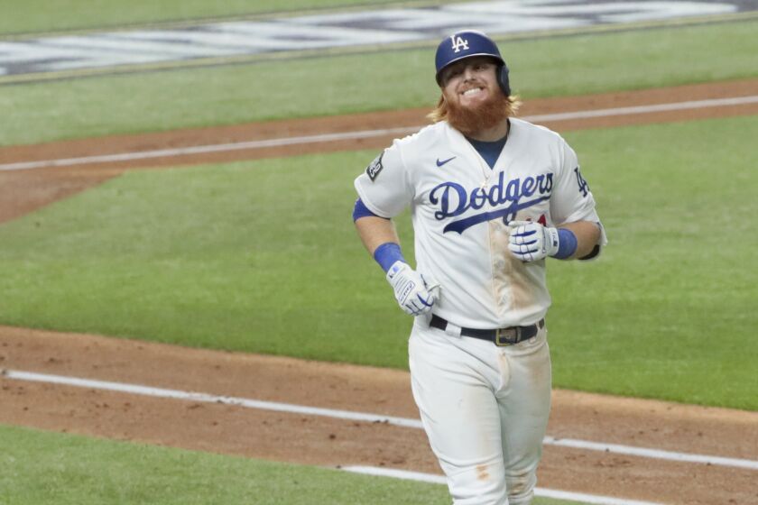 Dodgers third baseman Justin Turner shows frustration after just missing a homer in game 6 of the World Series.