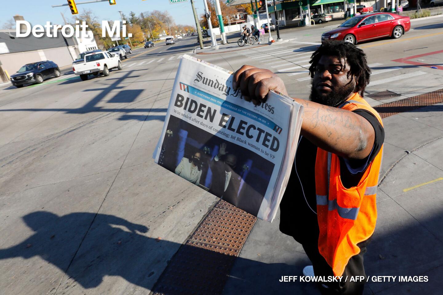 David Woods sells the Sunday Detroit Free Press announcing that Joe Biden has been declared President-elect in Detroit.