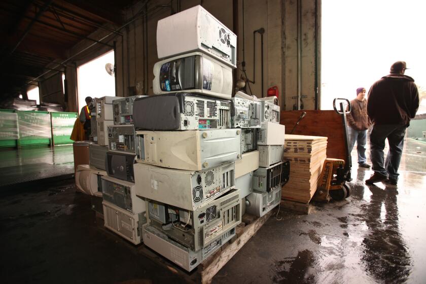 Old computers and other electronics must be taken to a specialty recycling center, such as this one in Paramount, where items are disassembled.