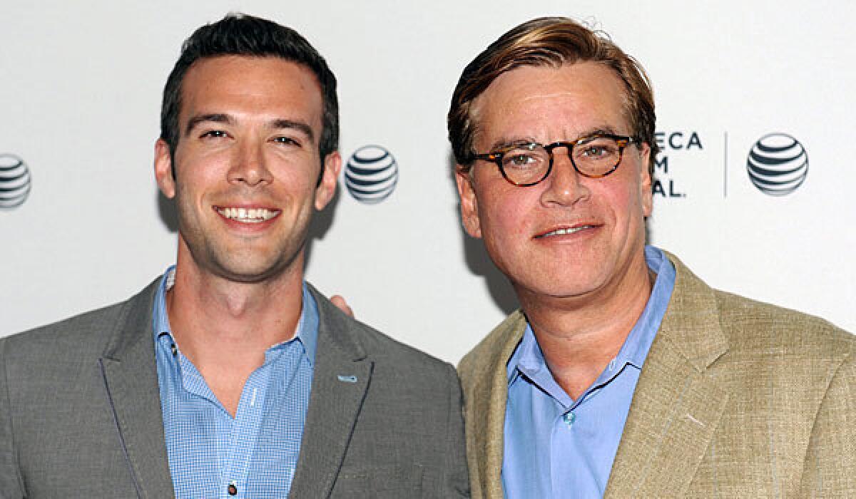 Aaron Sorkin, right, with Jon Favreau, former speechwriter for President Obama, who interviewed Sorkin at the Tribeca Film Festival.