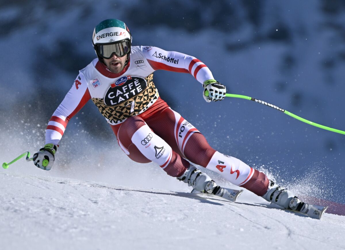 Vincent Kriechmayr of Austria in action during the men's downhill race at the Alpine Skiing FIS Ski World Cup in Wengen, Switzerland, Saturday, Jan. 15, 2022. (Jean-Christophe Bott/Keystone via AP)