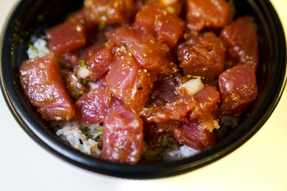 A Poke Bowl, Shoyu Ahi poke served over a bed of white rice, from Foodland Farms at the Ala Moana shopping center.