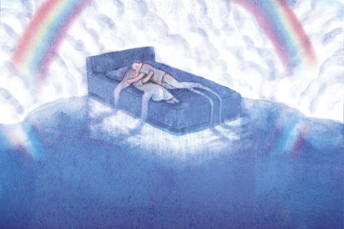 A woman and a man embrace atop a bed surrounded by a rainbow and clouds.