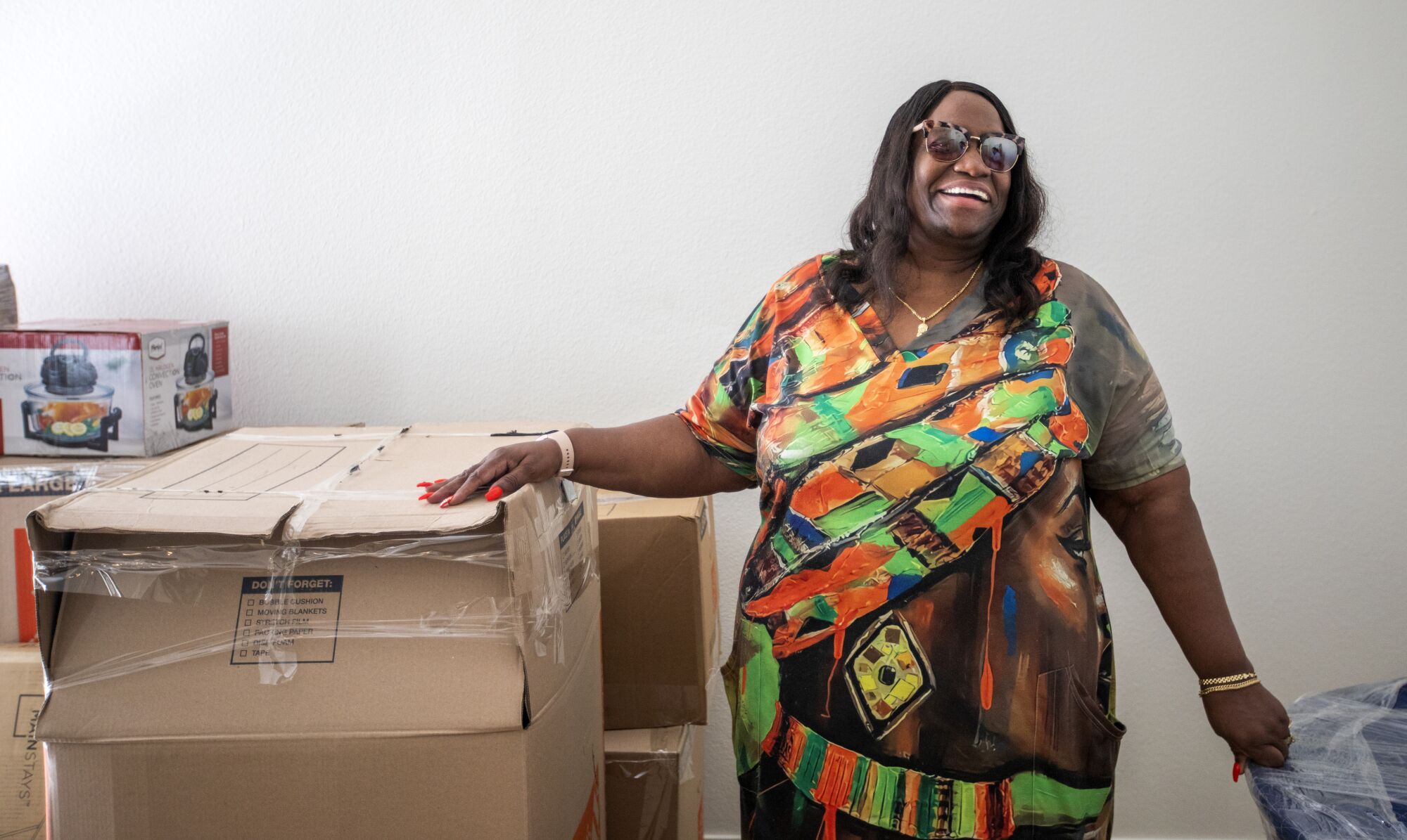 Diane Reed, 65, moves into her new home at Washington View Apartments in Los Angeles.
