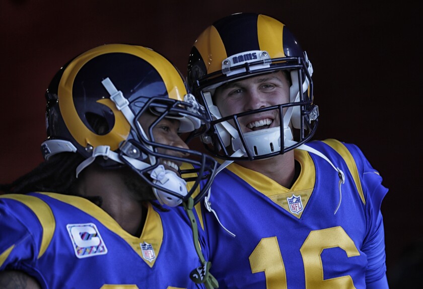 Todd Gurley, left, and Jared Goff share a laugh before a game.