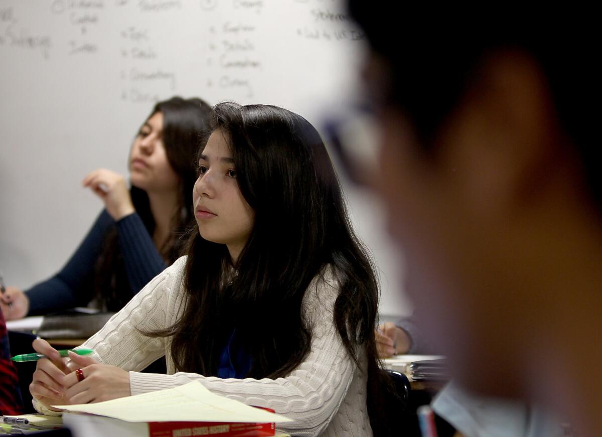 Students listen during an Advanced Placement American history class at Downtown Magnets High School in Los Angeles in 2013.