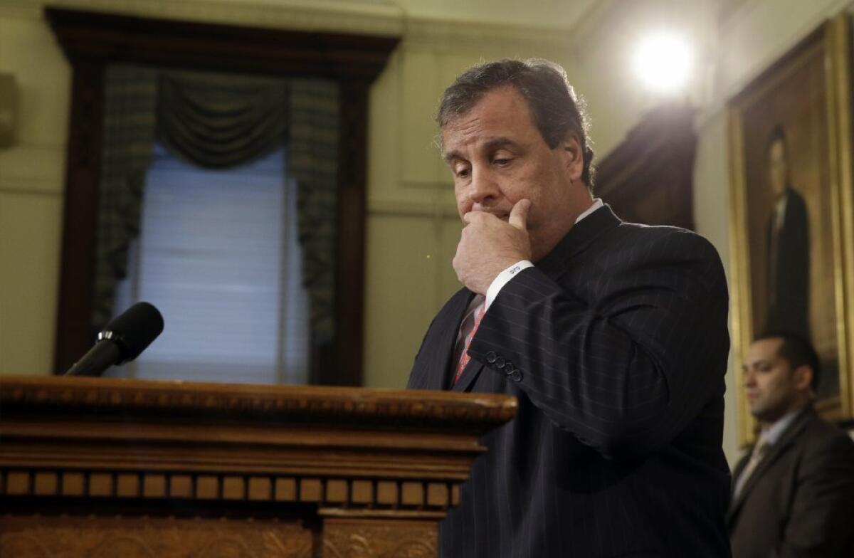 New Jersey Gov. Chris Christie speaks during a news conference in Trenton on Thursday. Christie fired a top aide who engineered political payback against a town mayor, saying she lied. Documents show she arranged traffic jams to punish the mayor, who didn't endorse Christie for reelection.