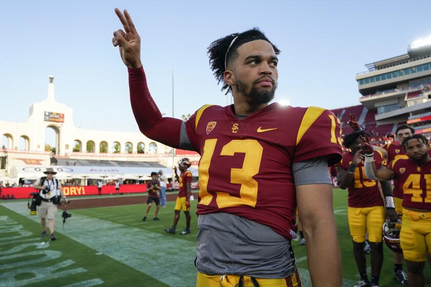 Southern California quarterback Caleb Williams (13) celebrates after a 66-14 win.