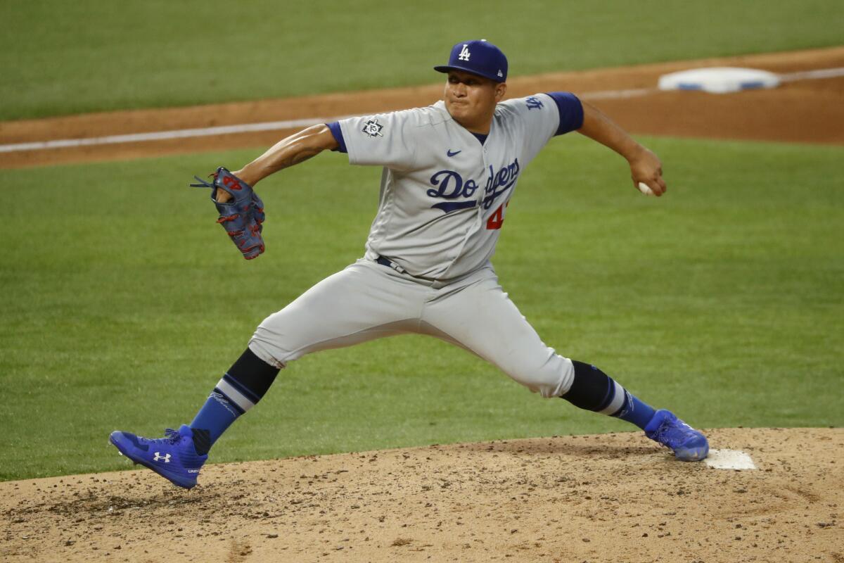 Dodgers reliever Victor González throws a pitch against the Texas Rangers on Aug. 30.