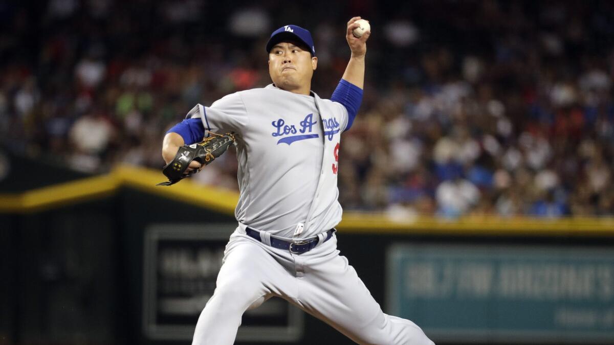 Dodgers starter Hyun-Jin Ryu delivers on the way to seven scoreless innings against the Arizona Diamondbacks.