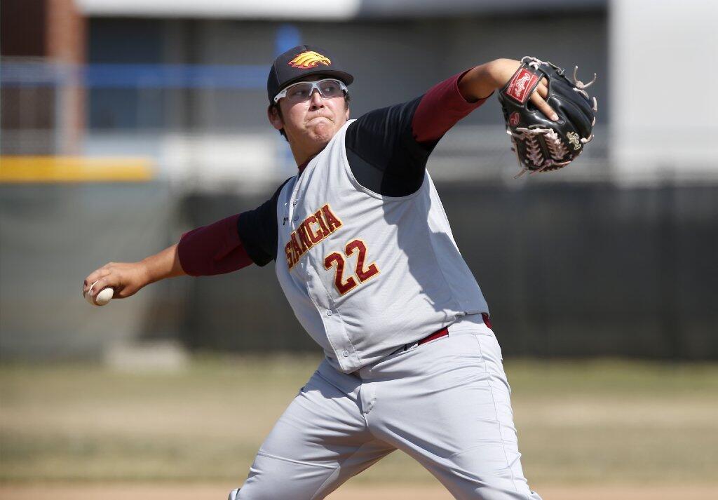 Estancia High's Spencer Stern delivers a pitch against Costa Mesa.