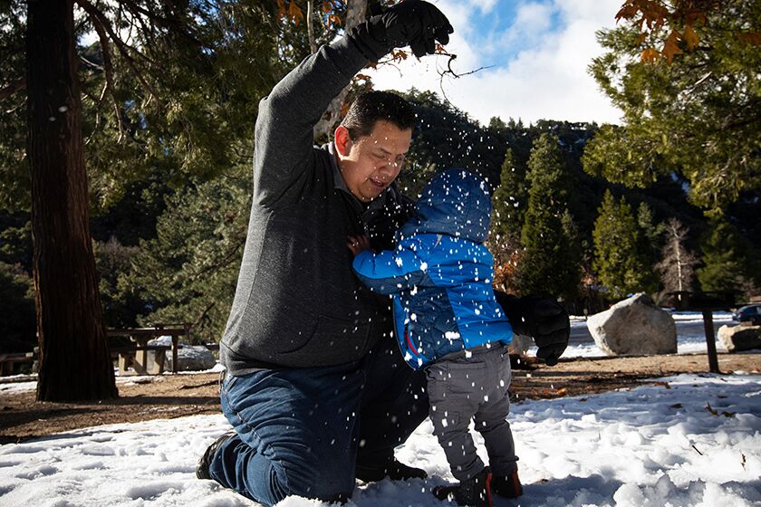 Martin Rivera of Covina and his family came to the Angeles National Forest to play in the snow on Christmas Eve.
