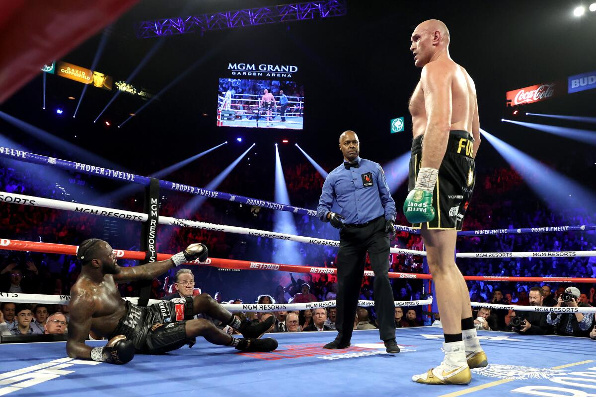 Deontay Wilder is sent to the canvas by Tyson Fury during the third round of their WBC heavyweight title fight on Feb. 22, 2020, in Las Vegas.