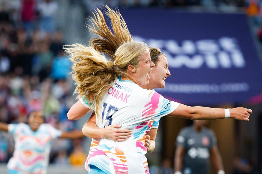 San Diego, CA - April 27: San Diego Wave FC's Makenzy Doniak (15) and Kyra Carusa (19) celebrate a goal against Bay City FC during their game at Snapdragon Stadium on Saturday, April 27, 2024 in San Diego, CA. (Meg McLaughlin / The San Diego Union-Tribune)